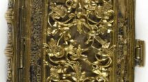 Minibücher Decorated_upper_cover_of_gold_open_leaf_tracery,_with_remains_of_black_enamel_in_the_frames_round_the_tracery;_with_the_two_rings_at_the_top_of_the_covers_intended_for_a_chain_tto_attach_the_volume_to_the_girdle._The_minute_volume_was_said_to_have_been_given_by_Anne_Boleyn,_when_on_the_scaffold,_to_one_of_her_maids_of_honour,_a_lady_of_the_Wyat_family. [Front_cover]. England_[London];_between_1509_and_1546. From:_John_Croke,_The_Penitential_and_other_Psalms. Stowe_956,_Binding London,_British_Library.